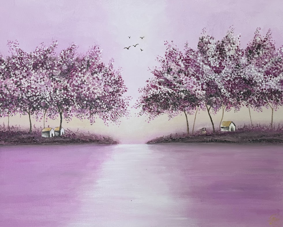 Lilac trees mirrored on a still lake at dusk